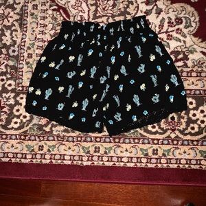 Black shorts with cactuses